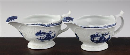 Two Worcester blue and white Little Fisherman pattern fluted sauceboats, c.1758-62, 6.75in., one cracked